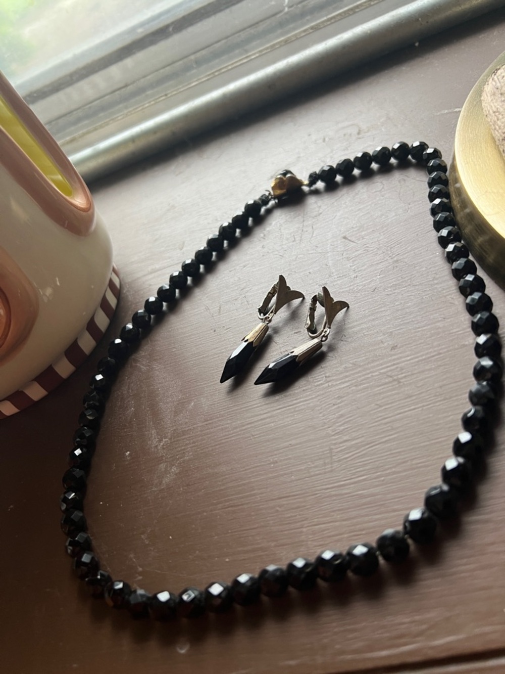 Pair of vintage black crystal earrings (clip on) and matching necklace
